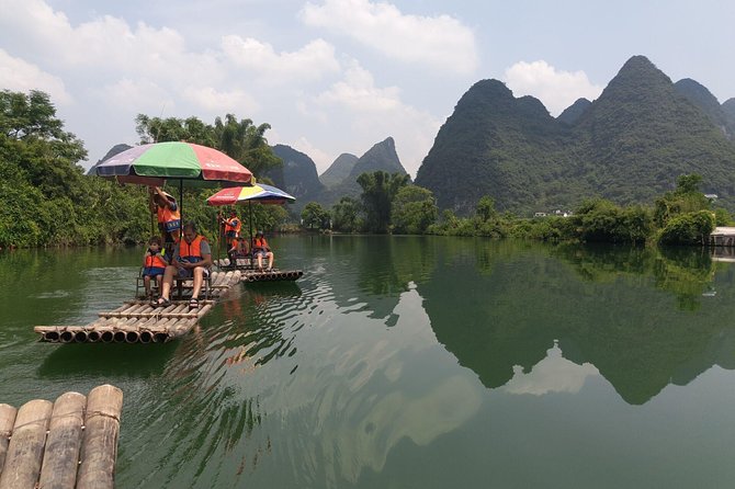 1 Day Yangshuo Countryside Cycling and Yulong bamboo boat Private Tour - Cycling past rice paddies and karst peaks