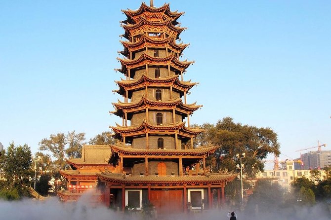 8-Day Silk Road Trip of Dunhuang, Jiayuguan, Zhangye with Accommodation - Day 2: Mogao Caves, White Horse Pagoda, and an evening show