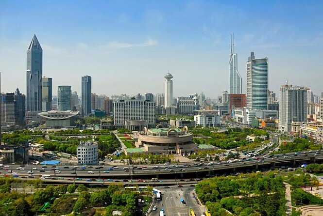 Authentic Local Food Tour in Central Shanghai - Walking toward Yunnan Road and the Former French Concession