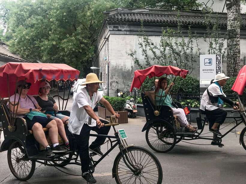 Beijing: Hutongs & Drum Tower City Walking Tour - Seeing a traditional courtyard home