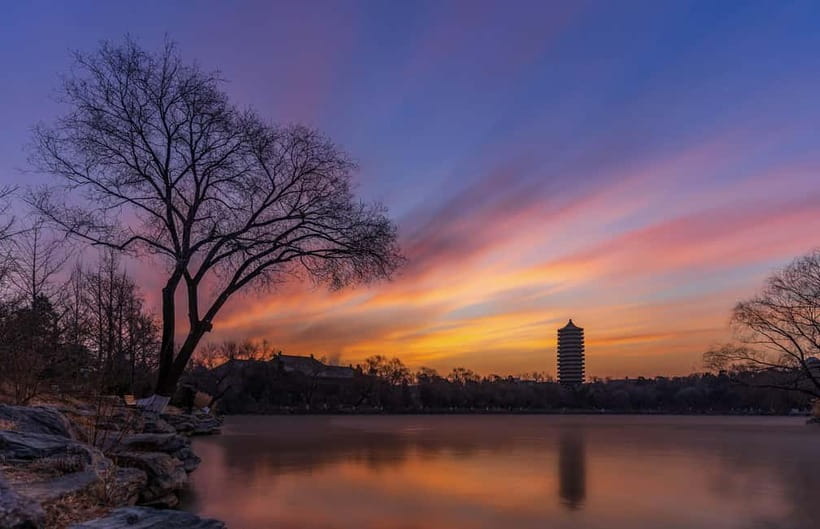 Beijing: Peking University Campus Guided Walking Tour - The Bell Pavilion, Hua Biao, and Qilin statues