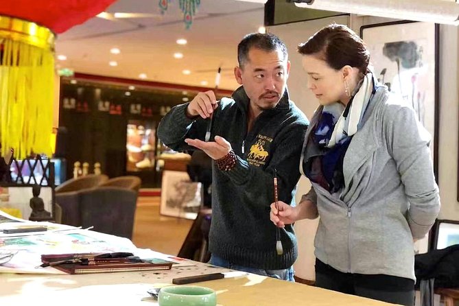 Beijing Wangfujing Calligraphy Class by Forbidden City - The first strokes and the tools on the table