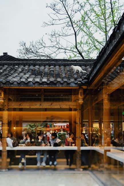 Chengdu: City Walking Tour with Food and Culture Stops - Narrow Alley’s coffee, books, and postcards
