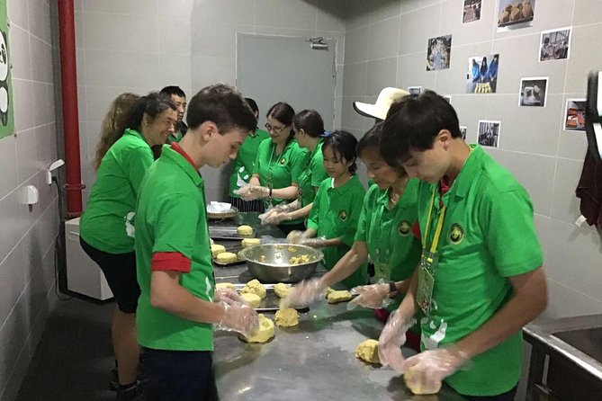 Dujiangyan Panda Volunteering Experience with Lunch - Checking in and putting on the work clothes
