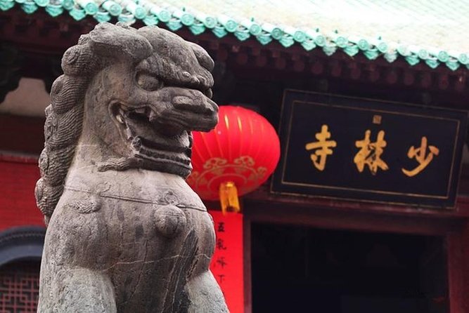 Form Xi'an To Luoyang Longmen Grottoes & Shaolin Temple Day Tour by Bullet Train - Longmen Grottoes and the river of carved Buddhas
