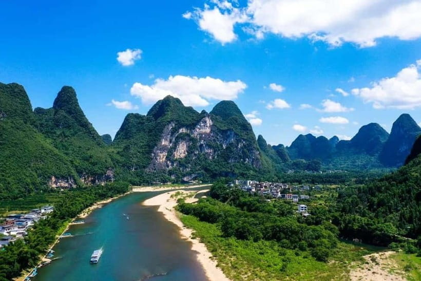 Guilin: Li River Cruise, Yangshuo Biking & Flexible Pricing - Guilin pickup and the long return to town