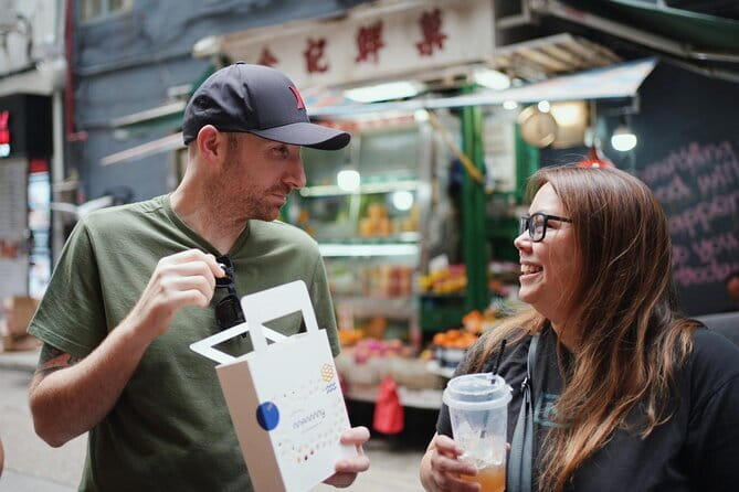 Hong Kong Street Food Tour with Locals - Dim Sum, Wonton & more - Sheung Wan Market adds milk tea and French toast