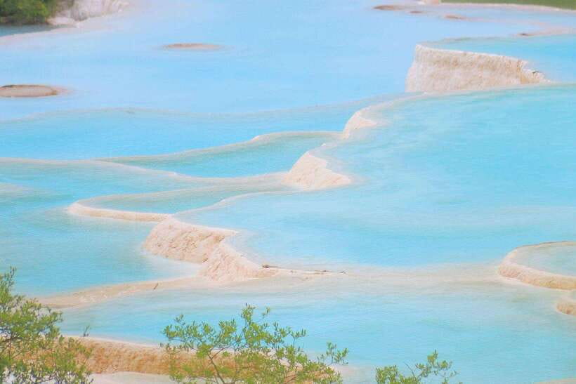 Huanglong Scenic Area: Explore Stunning Five-Colored Ponds - Why Huanglong’s pools are worth the trip
