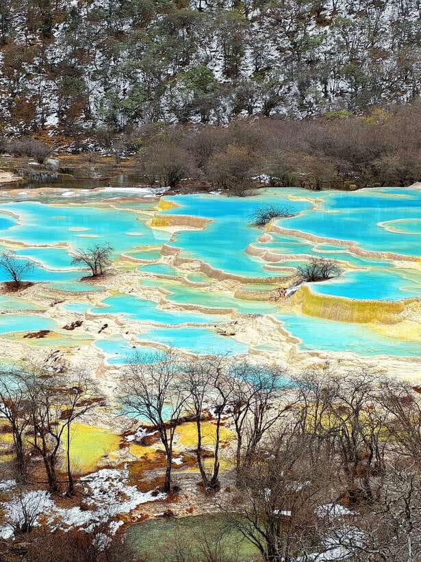 Huanglong Scenic Area: Explore Stunning Five-Colored Ponds - Six hours among pools, forests, and mountain views