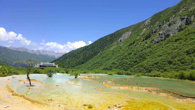 Huanglong Scenic Area: Explore Stunning Five-Colored Ponds - Golden Sand Pavement and the upper valley