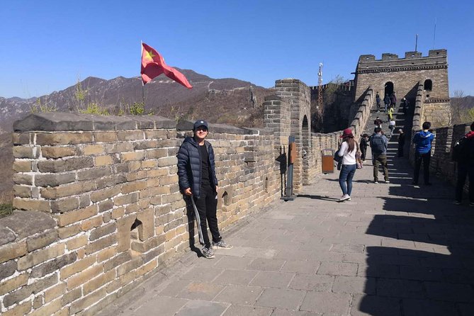 Private Mutianyu Great Wall Trip with English-Speaking Driver - Reaching the Wall: shuttle bus, tickets, and cable cars
