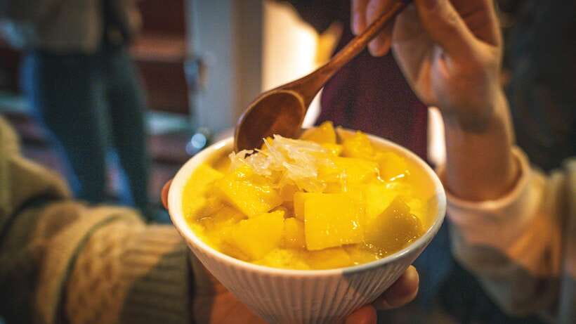 Shanghai: Evening Walking Food Tour - A fresh dessert with mango, sago, and pomelo