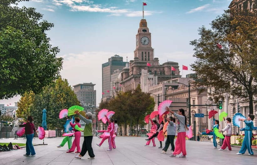 Shanghai Highlights Walking Tour With A Real Local - Nanjing Road and the route toward the river