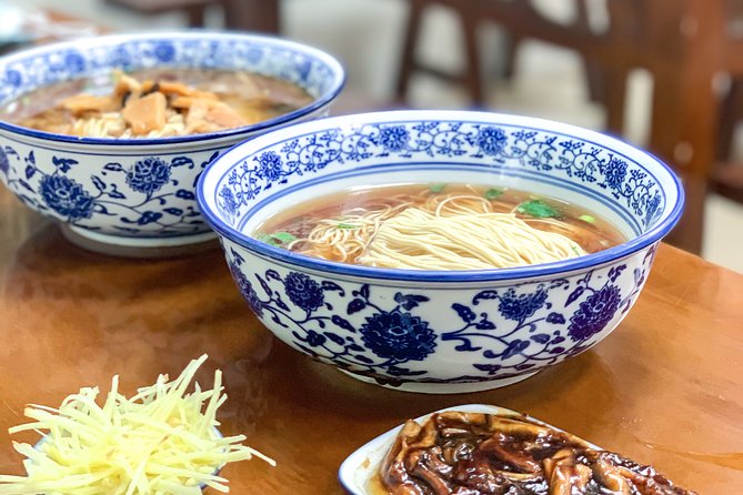 Suzhou Alleyway Walking Food Tour - Suzhou noodles, opera, and an unusually large menu