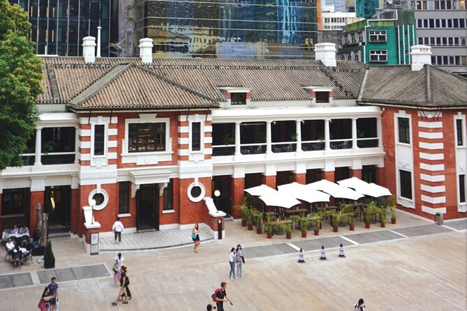 Top-Rated Hong Kong Tour: Peak Tram, Dim Sum & Cultural Sights - Returning to Central and entering Old Town