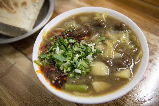 Xi'an Evening Food Tour by TukTuk - The Muslim Quarter, approached with a local guide