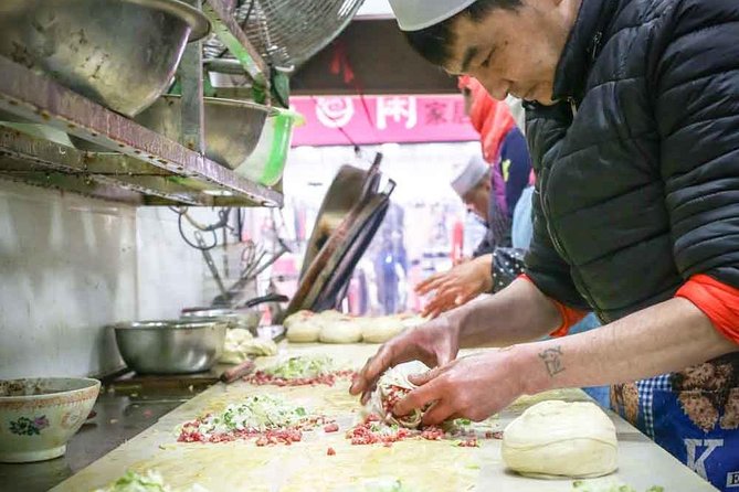 Xi'an Morning Food & Market Tour by TukTuk - Riding a tuk-tuk through the Muslim Quarter